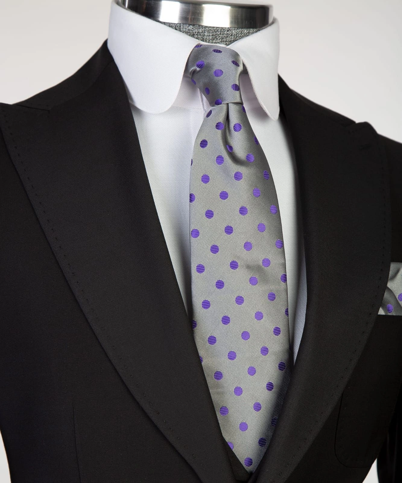 Three sleek black suits: effortlessly stylish for any occasion.