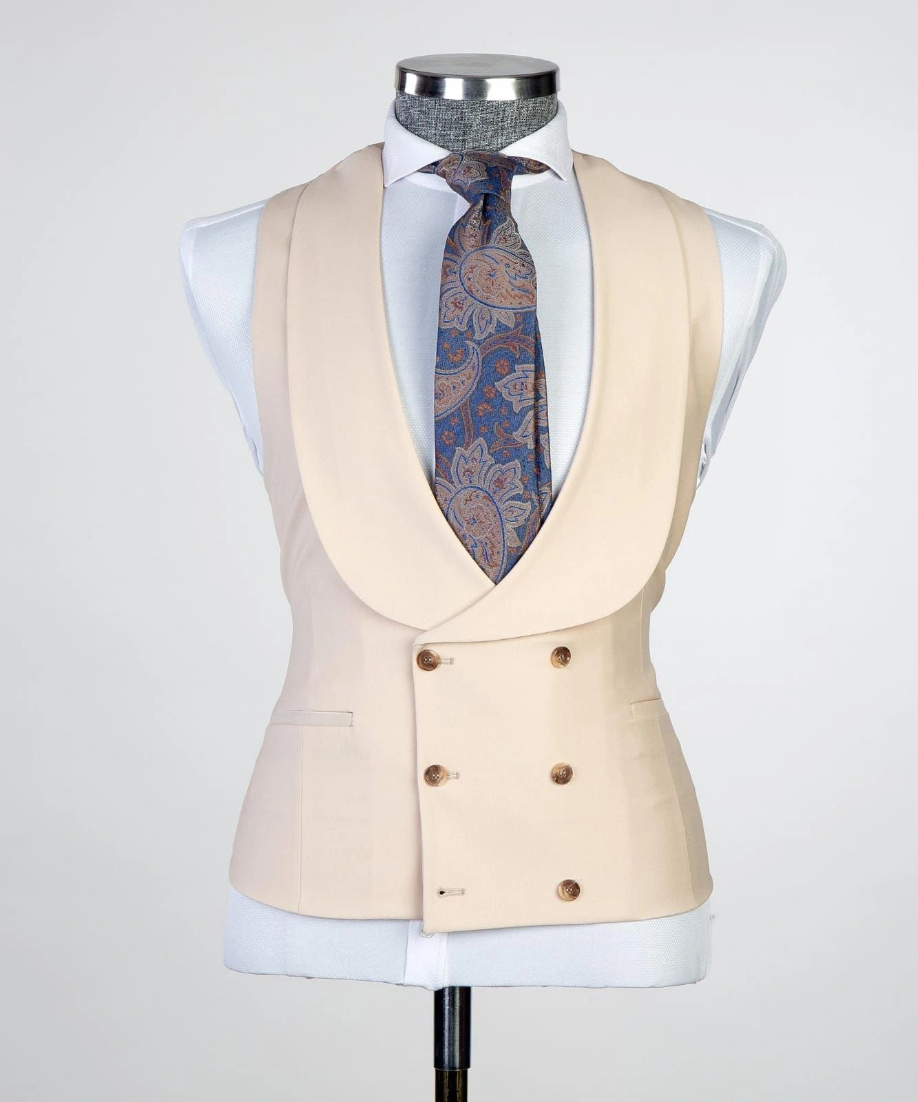 The quintessential beige trio: a sharp suit for the modern gent, ready to impress and conquer any occasion.