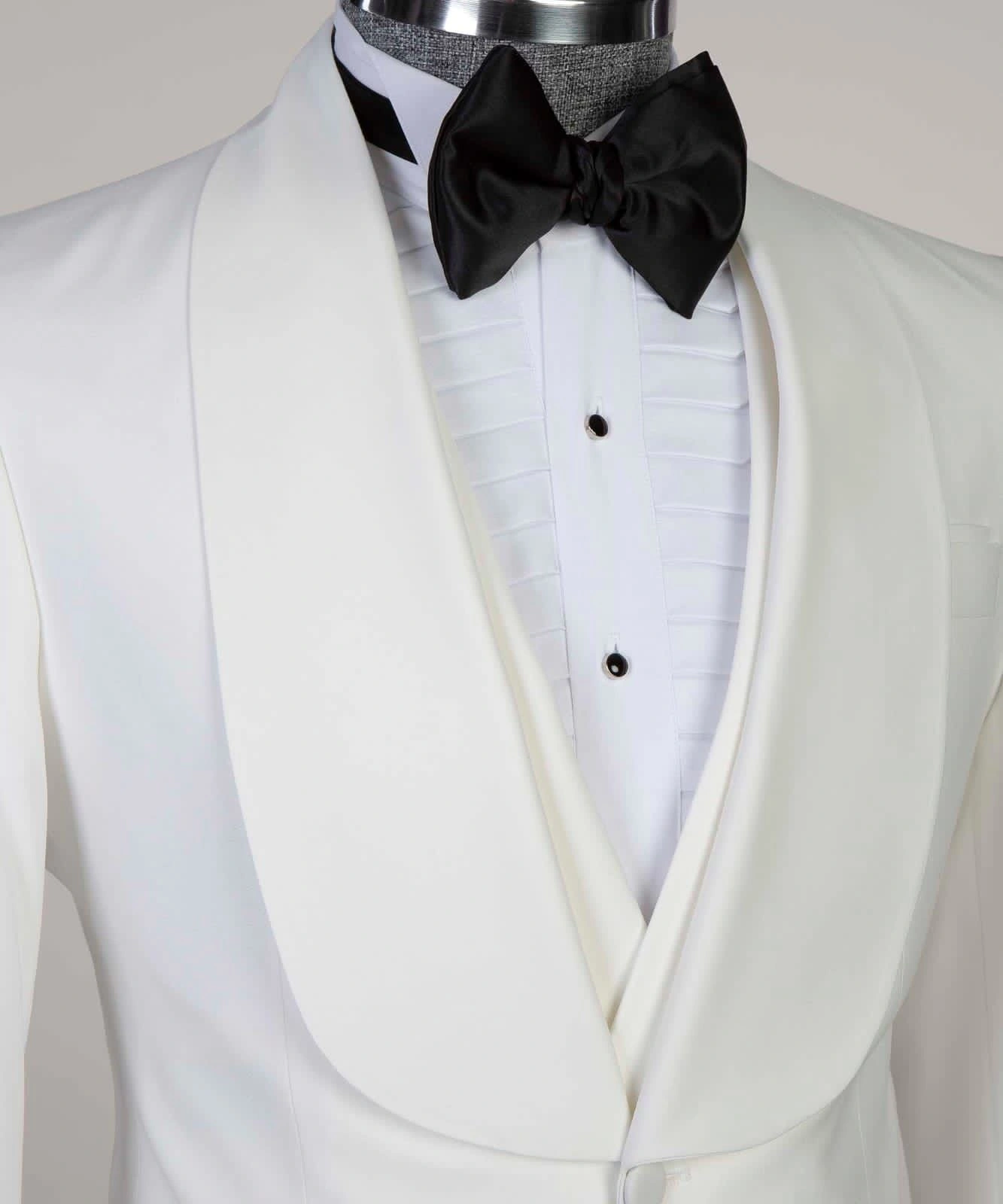 Simply White: The Quintessential Tuxedo. Elevate Your Evening.